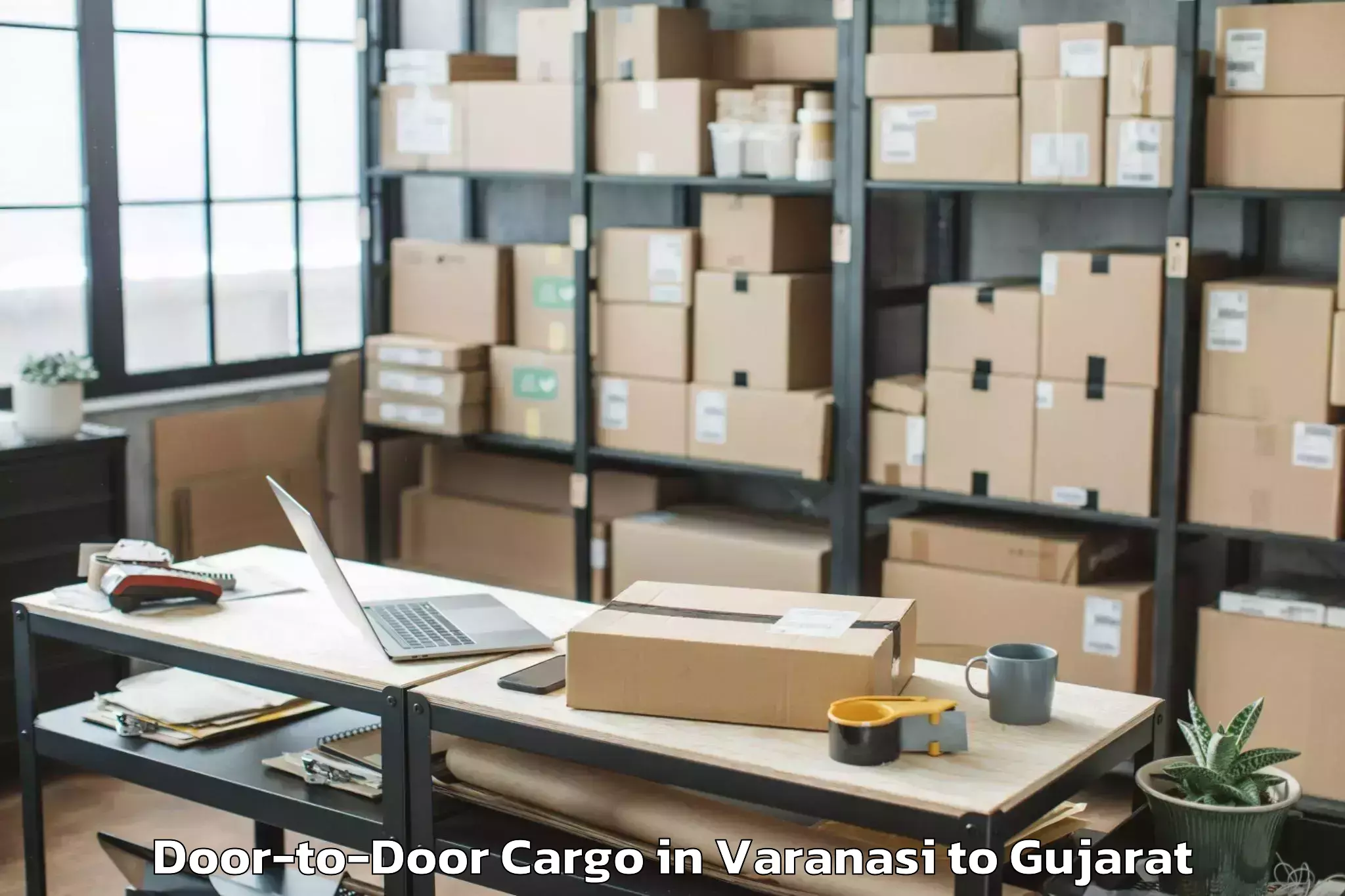 Easy Varanasi to Bhiloda Door To Door Cargo Booking